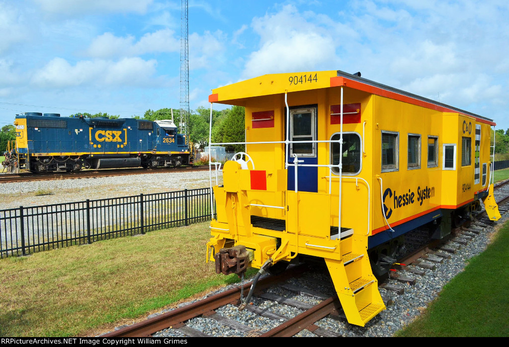 Local passing the Chessie Caboose